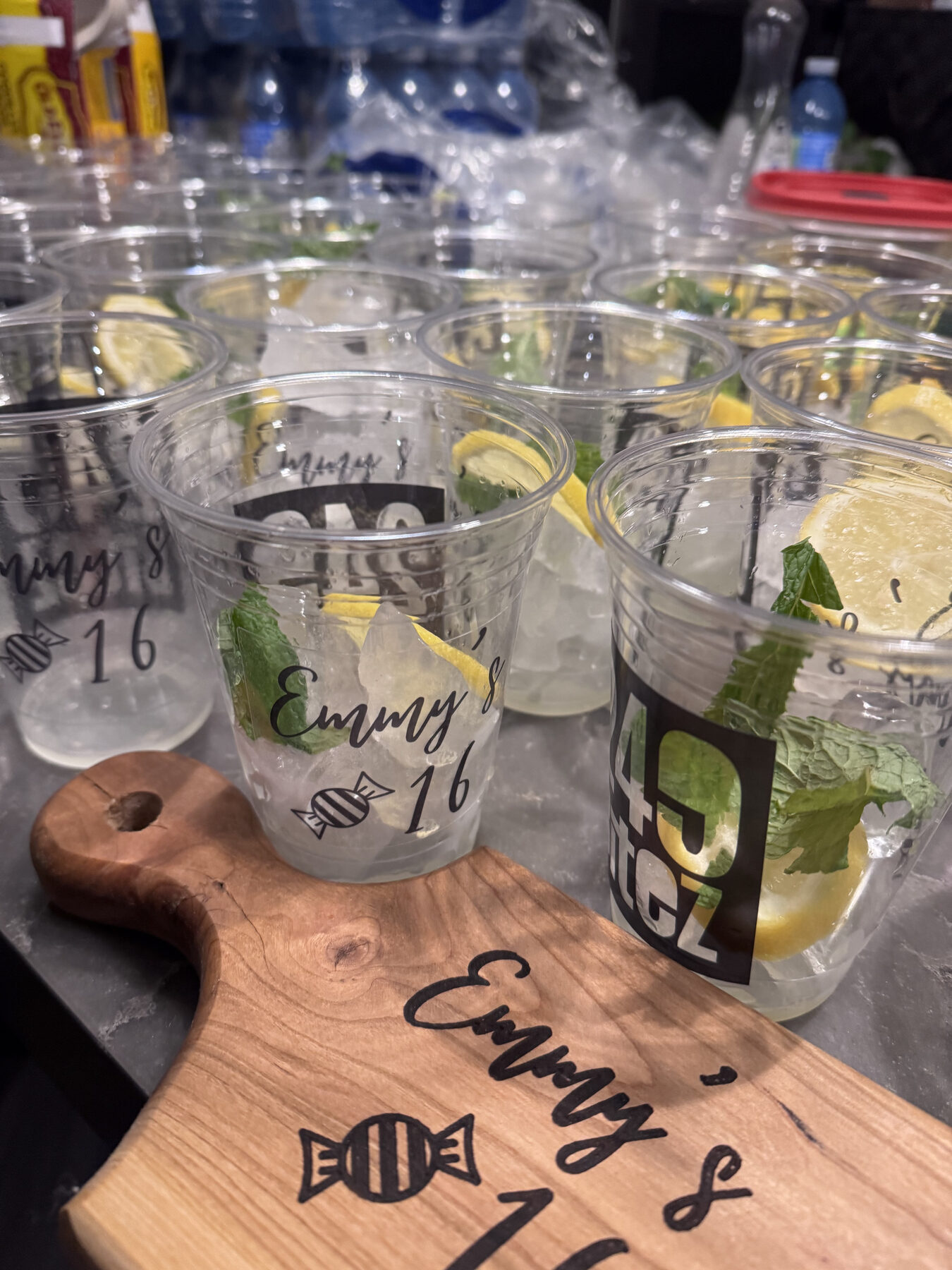 Mocktail mojitos in custom-printed party cups.