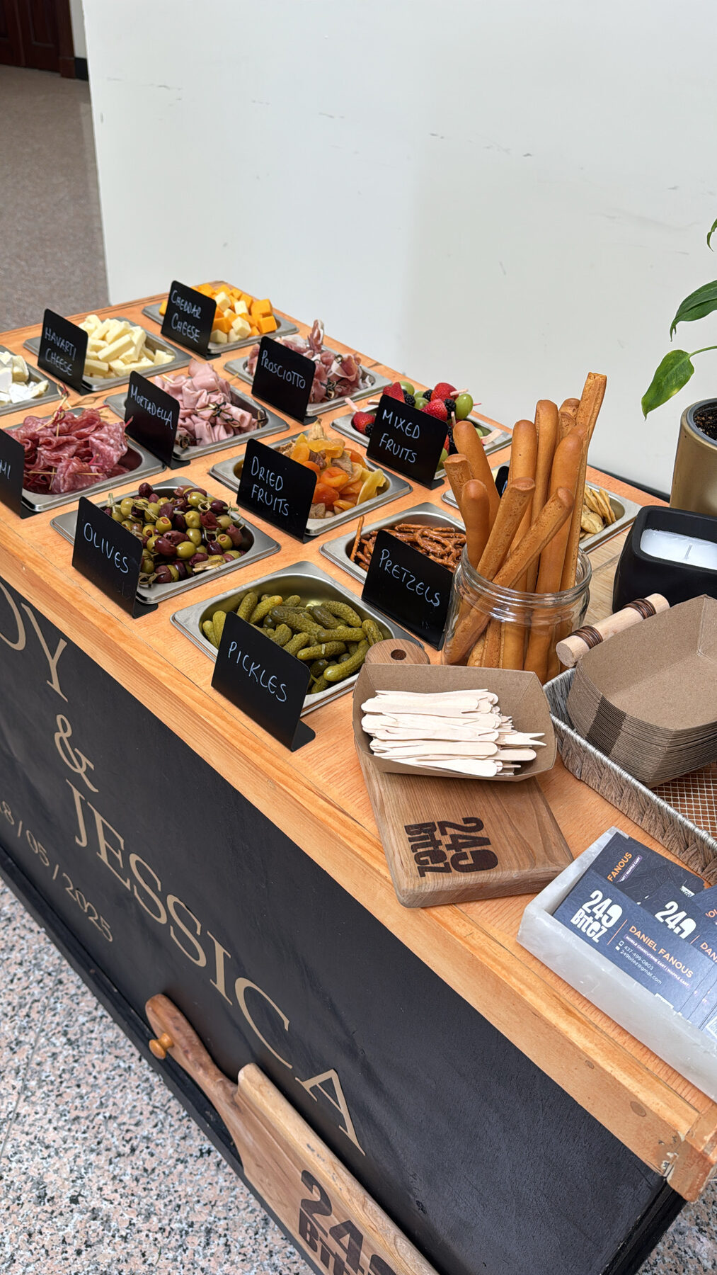 Labelled charcuterie stations on the Fady & Jessica cart.