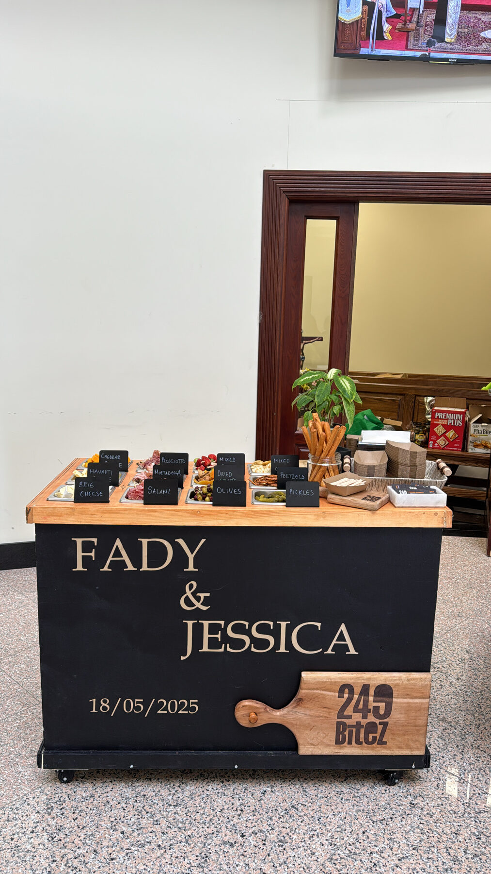 The charcuterie cart personalized in gold for Fady & Jessica's wedding.