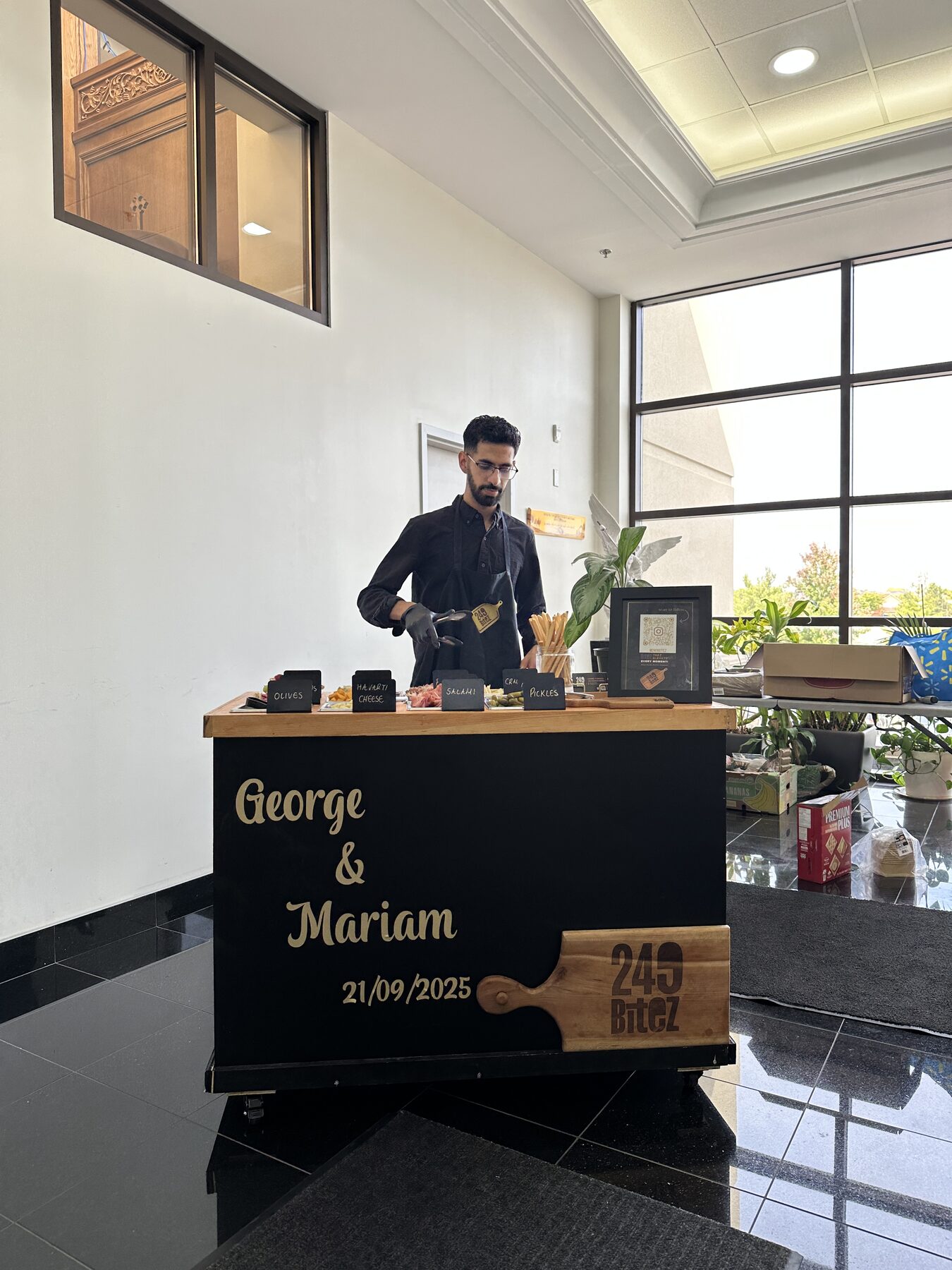 249 Bitez serving from a personalized charcuterie cart at a Toronto wedding.