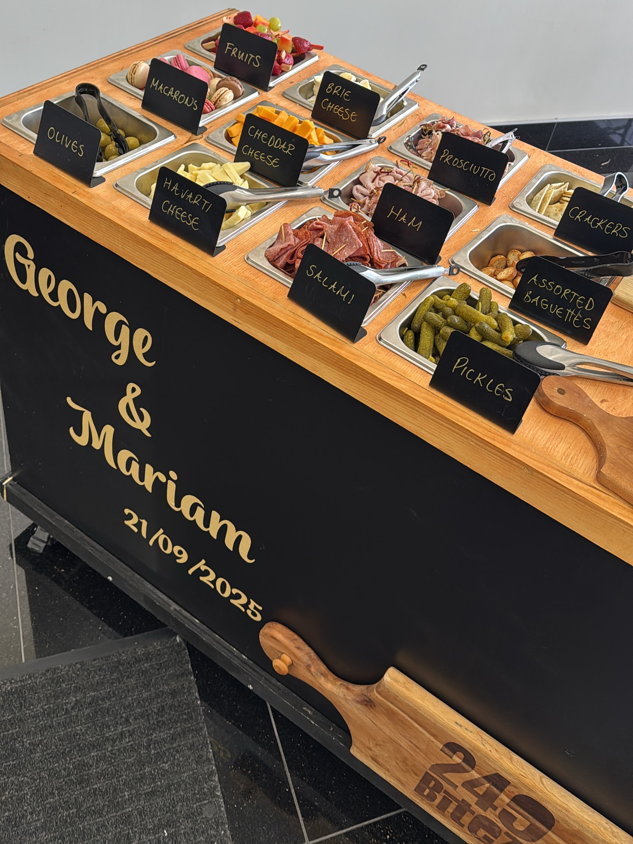 Charcuterie cart at a wedding.